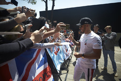 Lewis Hamilton, Mercedes AMG F1, signs autographs for fans