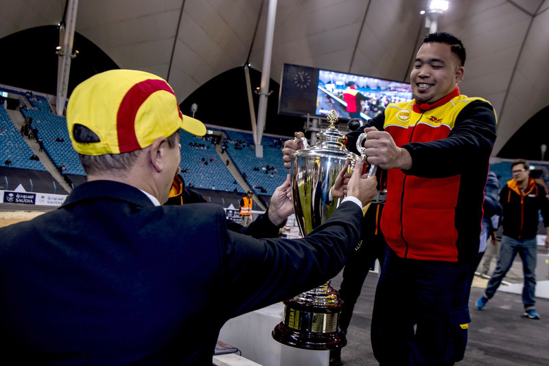 DHL delivers the trophies to the podium