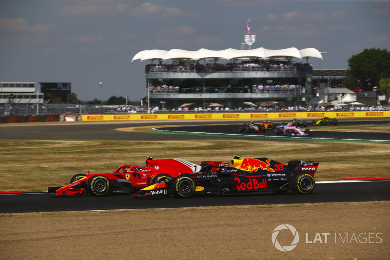 Kimi Raikkonen, Ferrari SH71H and Max Verstappen, Red Bull Racing RB14