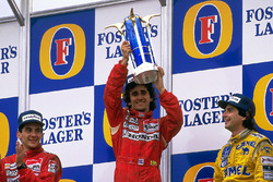 Podium: race winner Alain Prost, McLaren, second place Ayrton Senna, McLaren, third place Nelson Piquet, Lotus