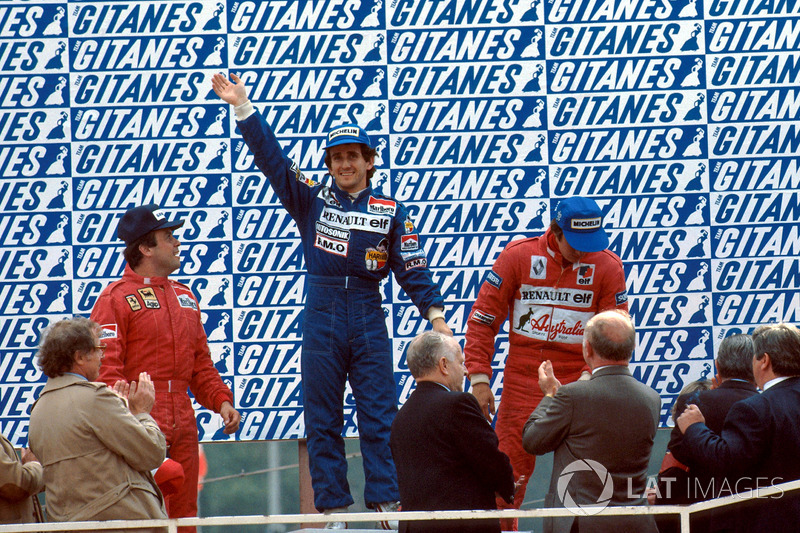 Podium: race winner Alain Prost, Renault, second place Patrick Tambay, Ferrari, third place Eddie Ch