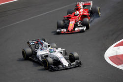 Felipe Massa, Williams FW40 and Sebastian Vettel, Ferrari SF70H battle