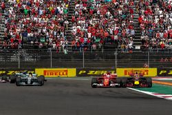 Max Verstappen, Red Bull Racing RB13 and Sebastian Vettel, Ferrari SF70H battle and collide at the start of the race