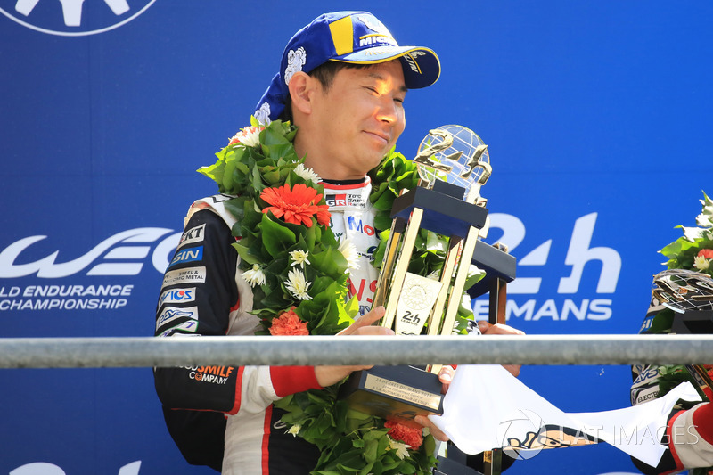 Overall podium: second place Mike Conway, Kamui Kobayashi, Jose Maria Lopez, Toyota Gazoo Racing