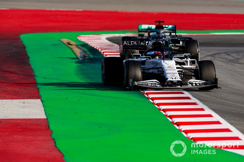 Pierre Gasly, AlphaTauri AT01 and Valtteri Bottas, Mercedes F1 W11