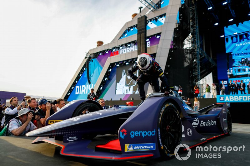 Race winner Sam Bird, Virgin Racing, Audi e-tron FE06 climbs out of his car on the podium