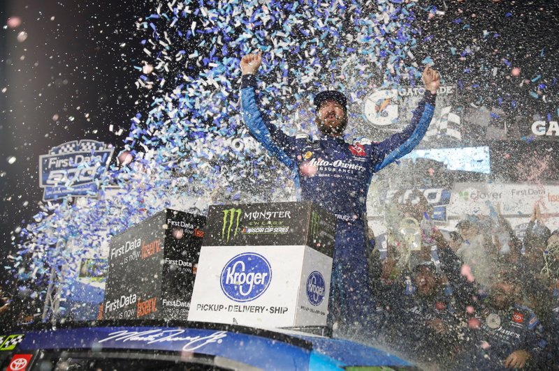 Martin Truex Jr., Joe Gibbs Racing, Toyota Camry Auto Owners Insurance celebrates winning the First Data 500 at Martinsville Speedway.