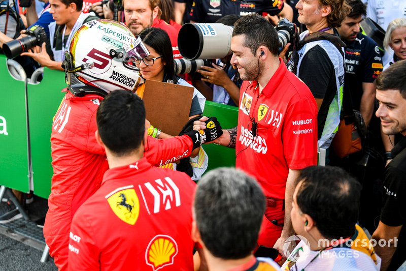 Sebastian Vettel, Ferrari, congratulates his team after Qualifying on the front row