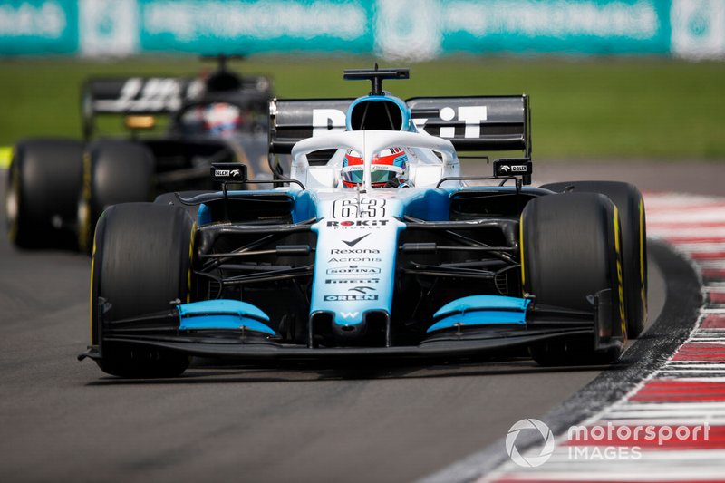 George Russell, Williams Racing FW42, precede Romain Grosjean, Haas F1 Team VF-19