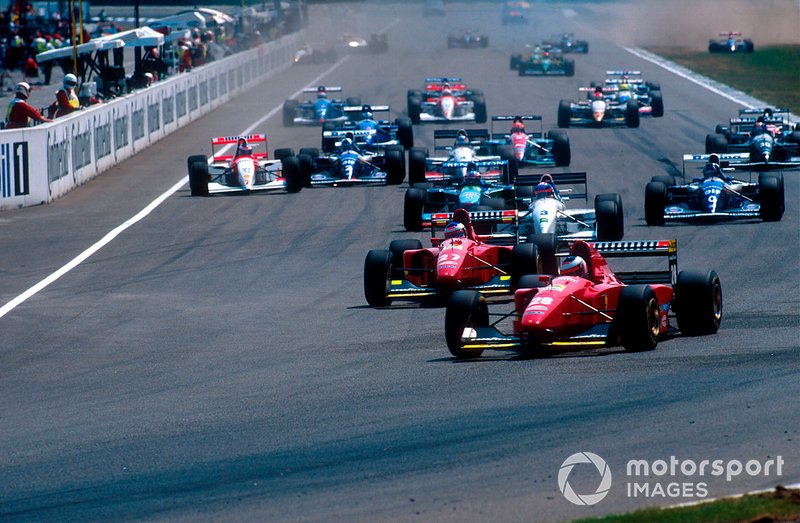 Gerhard Berger, Ferrari 412T1B leads teammate Jean Alesi, Ferrari 412T1B and Ukyo Katayama, Tyrrell 022 Yamaha at the start of the race