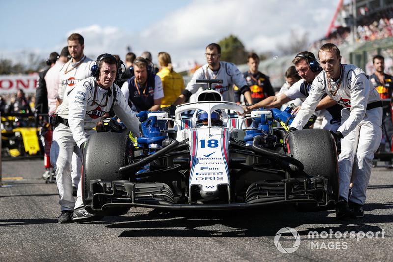 Lance Stroll, Williams FW41, arrives on the grid