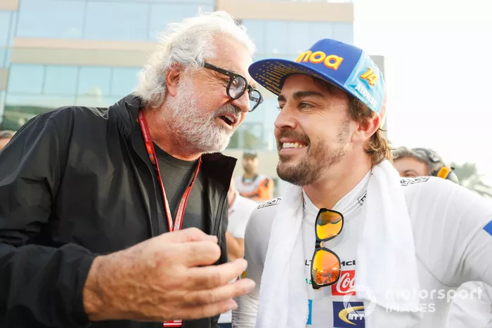 Fernando Alonso, McLaren, with Flavio Briatore on the grid