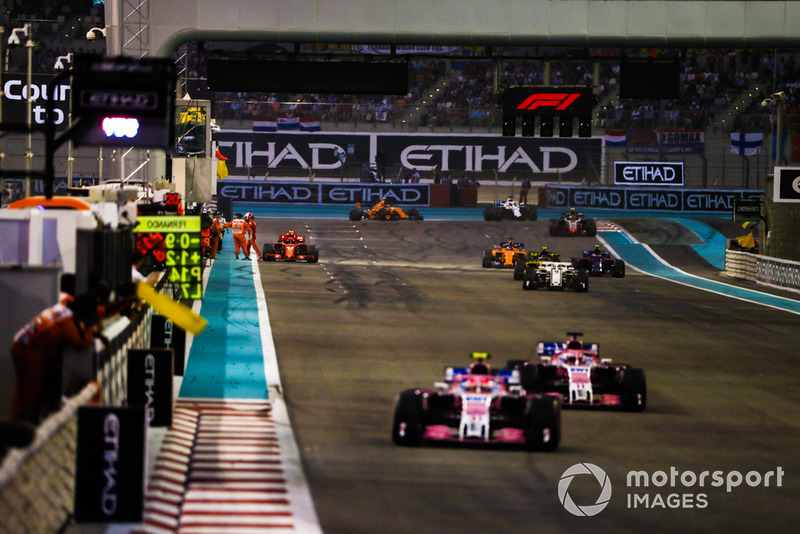 Esteban Ocon, Racing Point Force India VJM11, leads Sergio Perez, Racing Point Force India VJM11, and Marcus Ericsson, Sauber C37