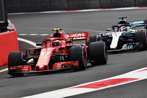 Kimi Raikkonen, Ferrari SF71H and Lewis Hamilton, Mercedes AMG F1 W09 EQ Power+ 