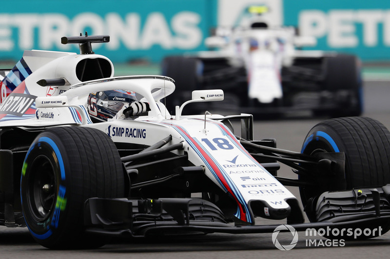 Lance Stroll, Williams FW41, leads Sergey Sirotkin, Williams FW41