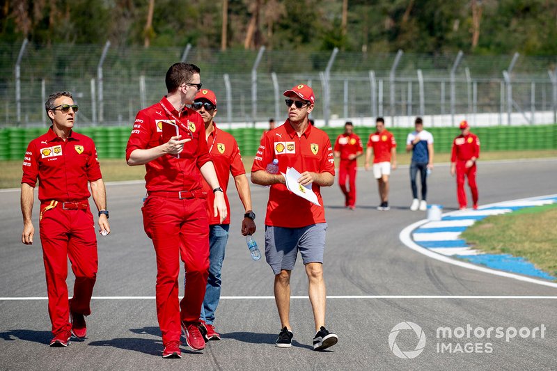 Sebastian Vettel, Ferrari walks the track with his mechanics