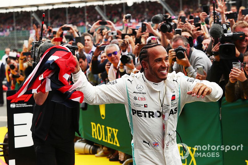 Race winner Lewis Hamilton, Mercedes AMG F1 W10 with a flag
