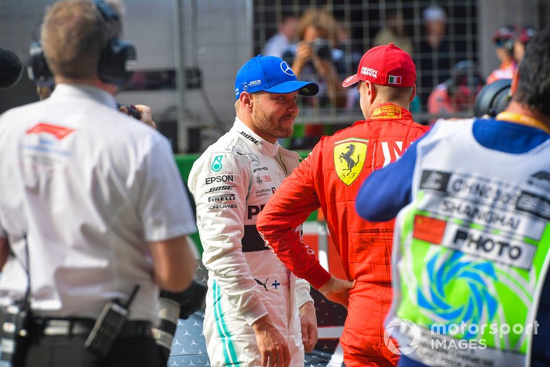 Pole man Valtteri Bottas, Mercedes AMG F1, on the grid with Sebastian Vettel, Ferrari,