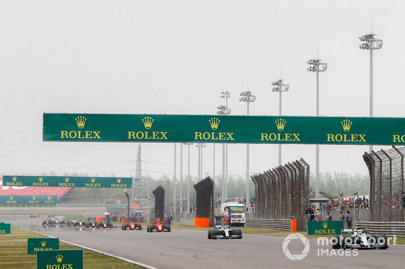 Lewis Hamilton, Mercedes AMG F1 W10, leads Valtteri Bottas, Mercedes AMG W10, Charles Leclerc, Ferrari SF90, and Sebastian Vettel, Ferrari SF90