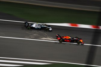 Max Verstappen, Red Bull Racing RB15, battles with Valtteri Bottas, Mercedes AMG W10