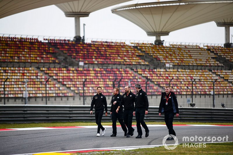 Romain Grosjean, Haas F1 walks the track with his team