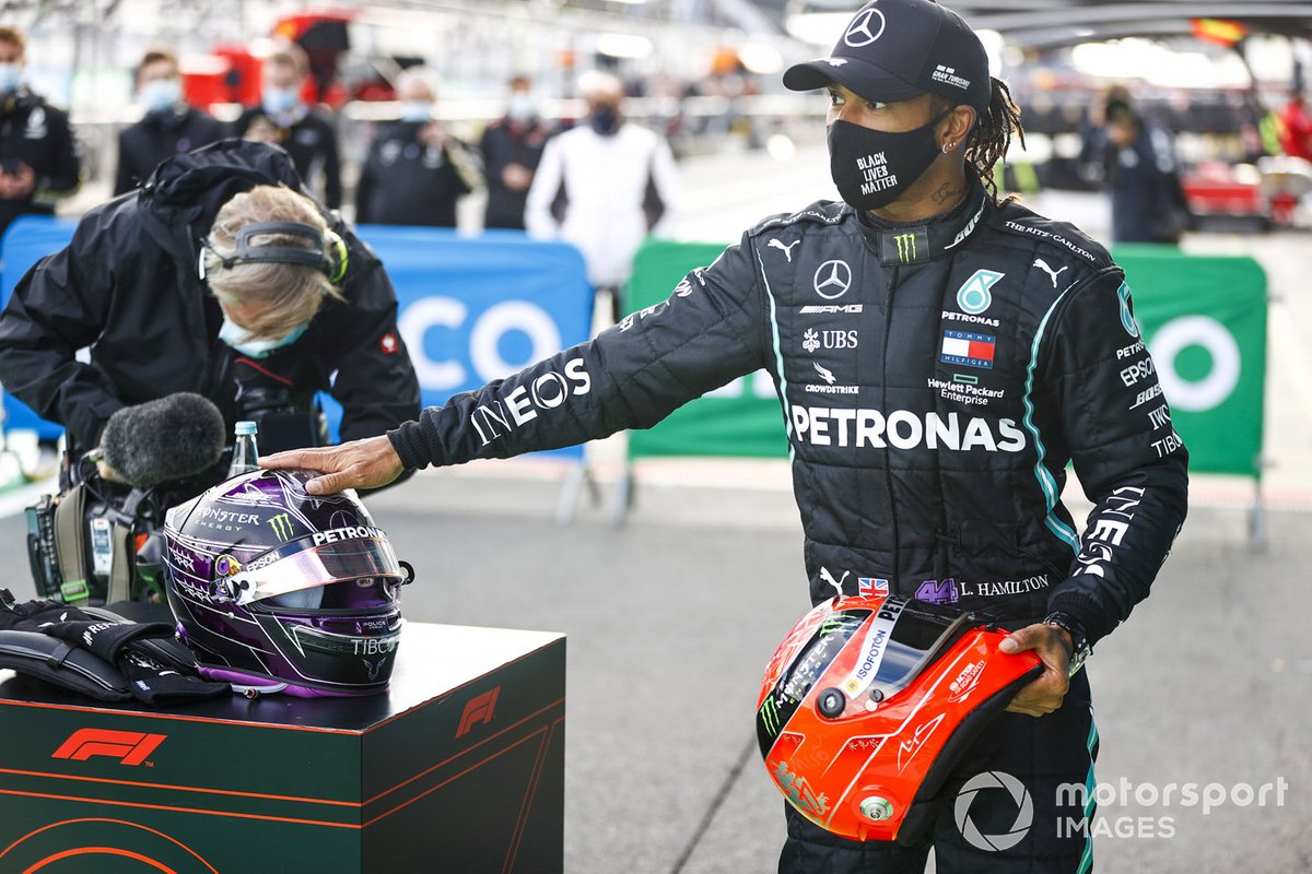 Lewis Hamilton, Mercedes-AMG F1, 1st position, with the helmet of Michael Schumacher in Parc Ferme