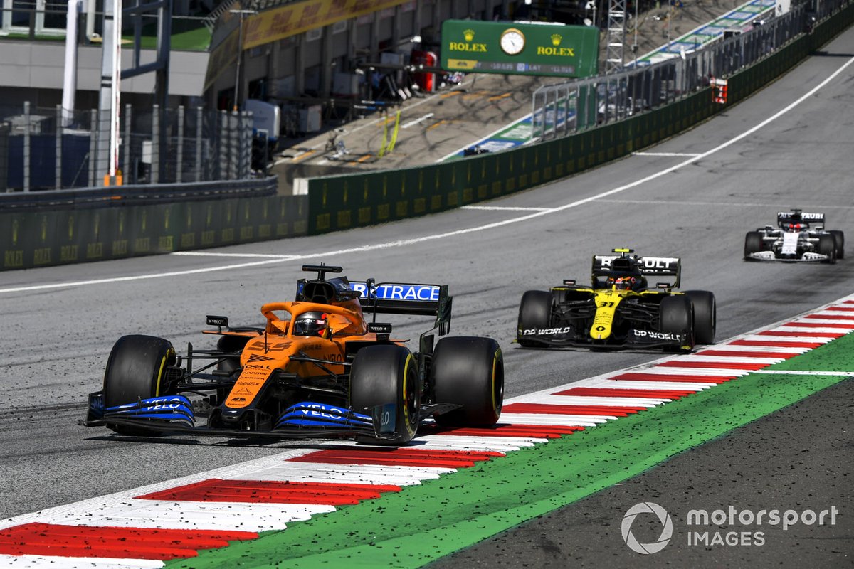 Carlos Sainz Jr., McLaren MCL35, leads Esteban Ocon, Renault F1 Team R.S.20, and Daniil Kvyat, AlphaTauri AT01