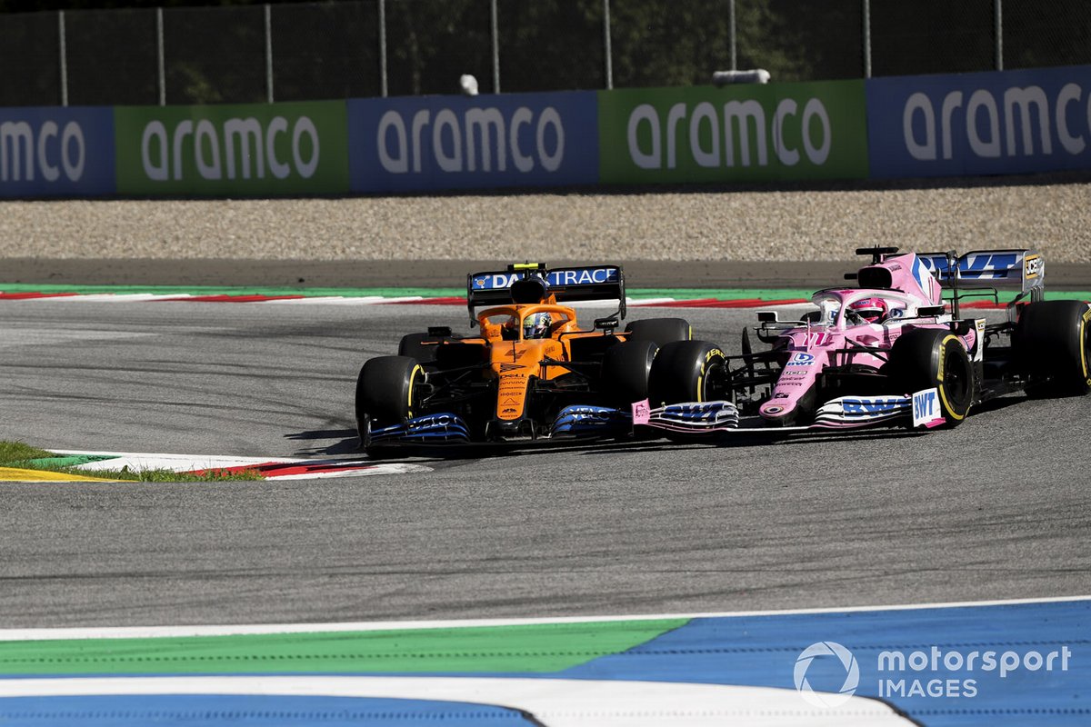 Lando Norris, McLaren MCL35, battles with Sergio Perez, Racing Point RP20