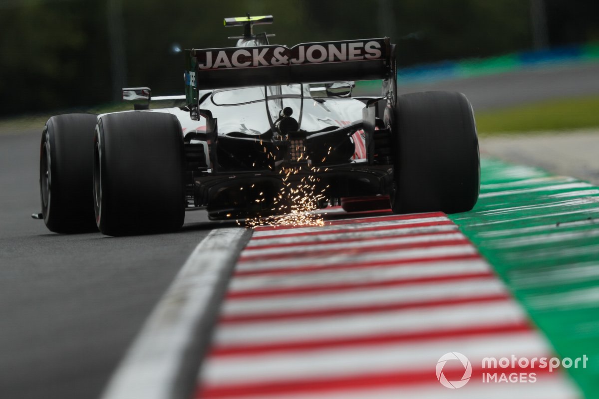 Sparks kick up from Kevin Magnussen, Haas VF-20