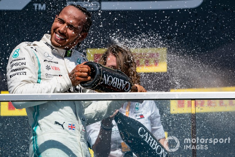 Lewis Hamilton, Mercedes AMG F1, 1st position, sprays Champagne on the podium
