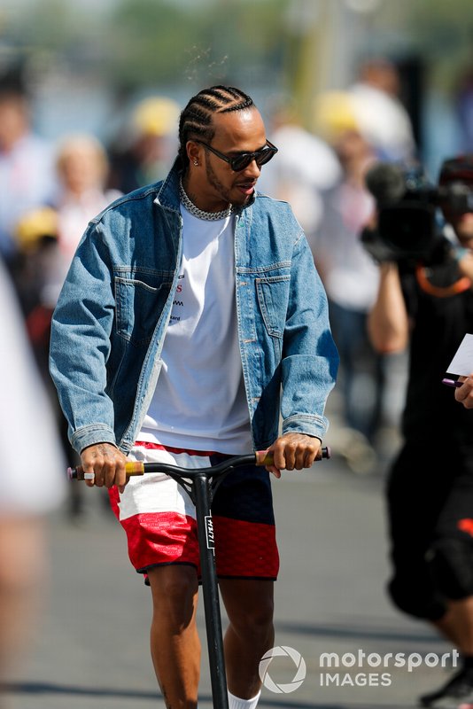 Lewis Hamilton, Mercedes AMG F1 on a scooter in the paddock