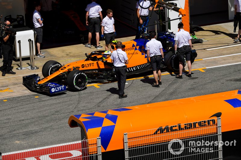 Lando Norris, McLaren MCL34, in pit lane
