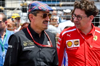 Guenther Steiner, Team Principal, Haas F1, and Mattia Binotto, Team Principal Ferrari