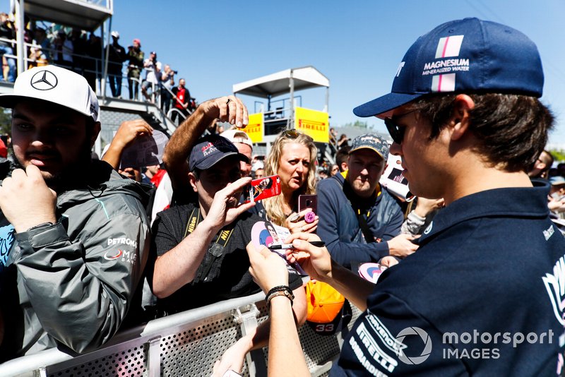 Lance Stroll, Racing Point signs a autograph for a fan