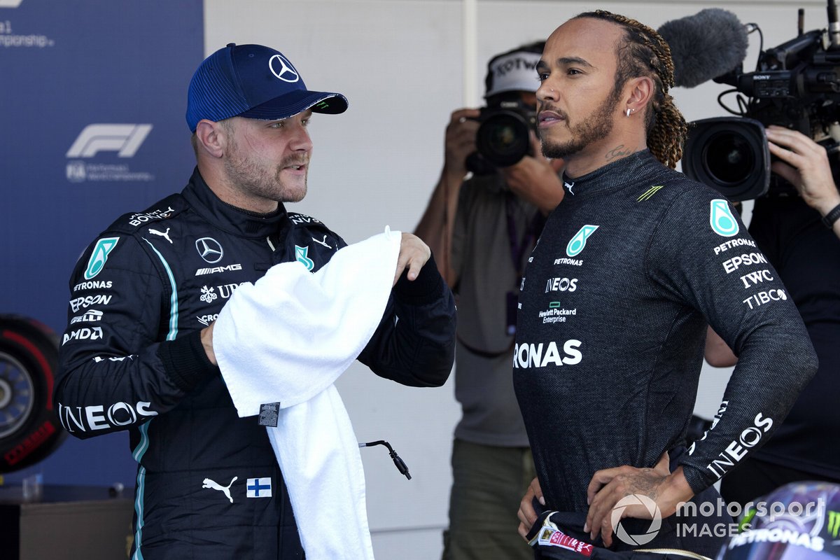 Valtteri Bottas, Mercedes, and pole man Lewis Hamilton, Mercedes, in Parc Ferme