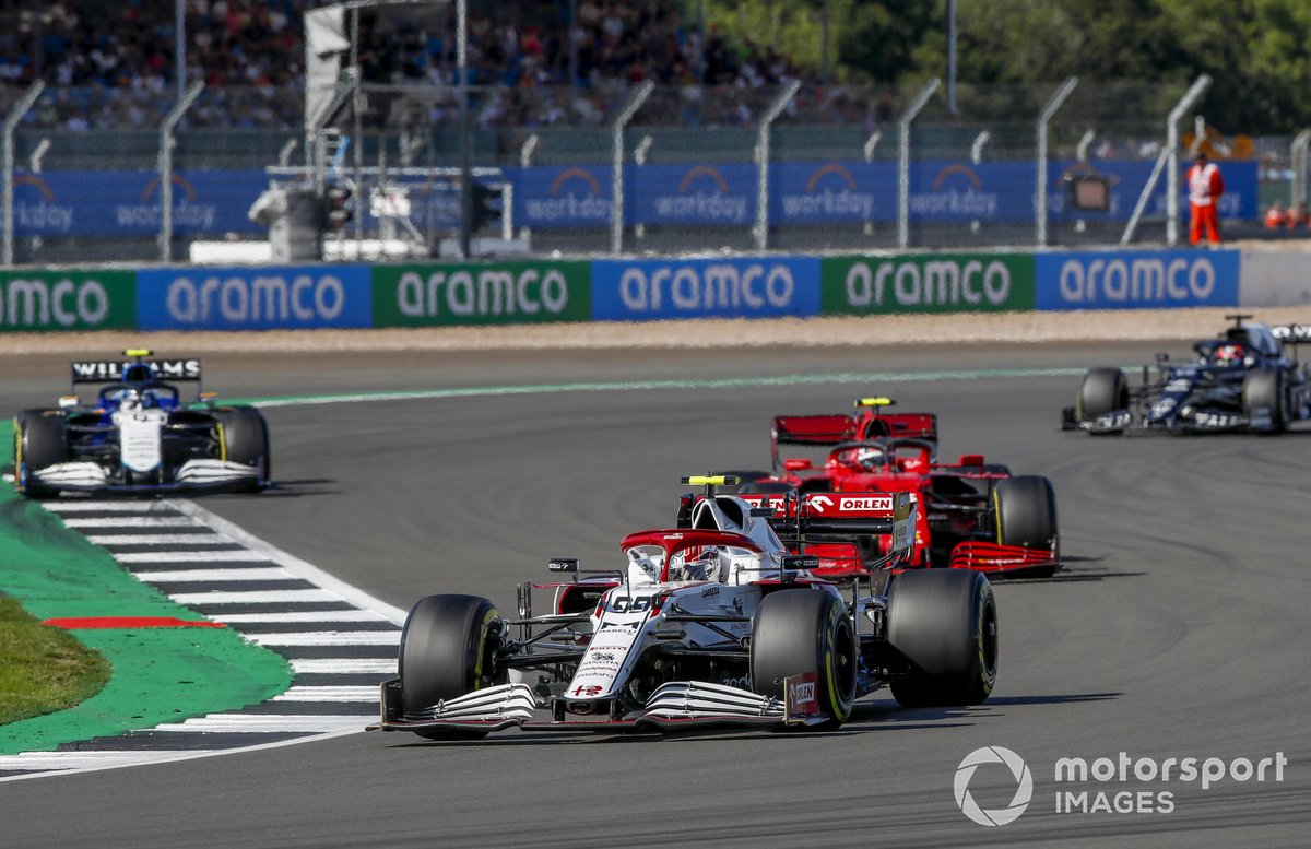 Antonio Giovinazzi, Alfa Romeo Racing C41, Carlos Sainz Jr., Ferrari SF21, and Nicholas Latifi, Williams FW43B