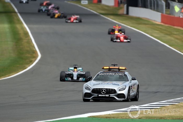 Safety car leads the field