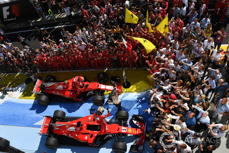 Race winner Sebastian Vettel, Ferrari and Kimi Raikkonen, Ferrari celebrate in parc ferme