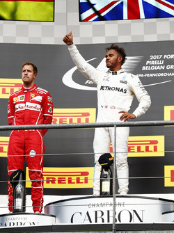 Lewis Hamilton, Mercedes AMG F1 alongside Sebastian Vettel, Ferrari