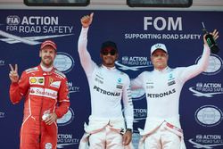 Top three qualifiers Lewis Hamilton, Mercedes AMG, Sebastian Vettel, Ferrari, and Valtteri Bottas, Mercedes AMG