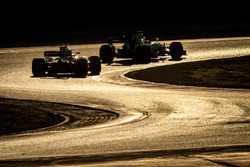 Felipe Massa, Williams FW40 leads Sebastian Vettel, Ferrari SF70H