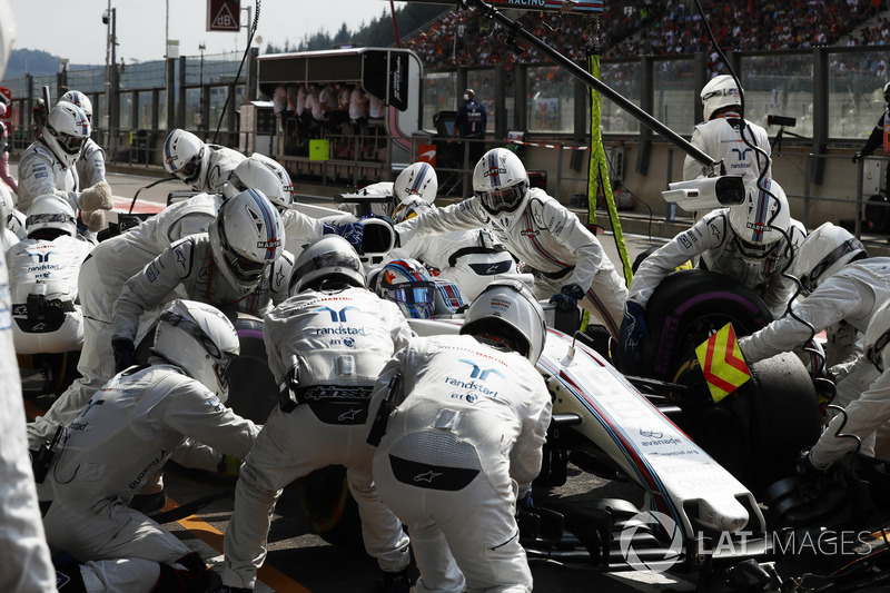 Guy Martin joins the Williams F1 pit crew during the race in the position of left rear off