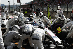 Guy Martin joins the Williams F1 pit crew during the race in the position of left rear off