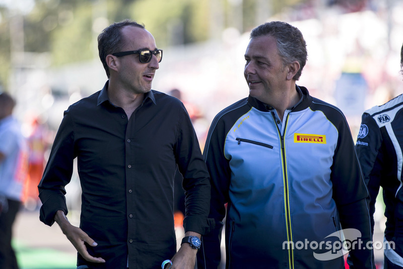 Robert Kubica con Mario Isola, Pirelli