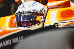 Fernando Alonso, McLaren, in cockpit with helmet visor raised