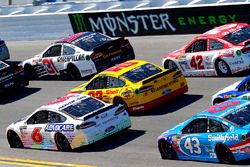 Trevor Bayne, Roush Fenway Racing Ford and Joey Logano, Team Penske Ford Monster signage