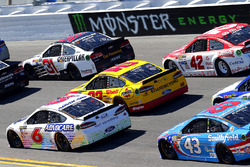Trevor Bayne, Roush Fenway Racing Ford and Joey Logano, Team Penske Ford Monster signage