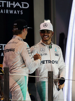 World Champion Nico Rosberg, Mercedes AMG F1 shakes hands with team mate and race winner Lewis Hamilton, Mercedes AMG F1