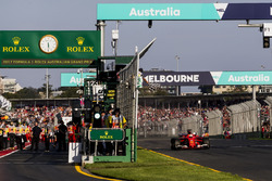 Sebastian Vettel, Ferrari SF70H, takes the chequered flag for victory