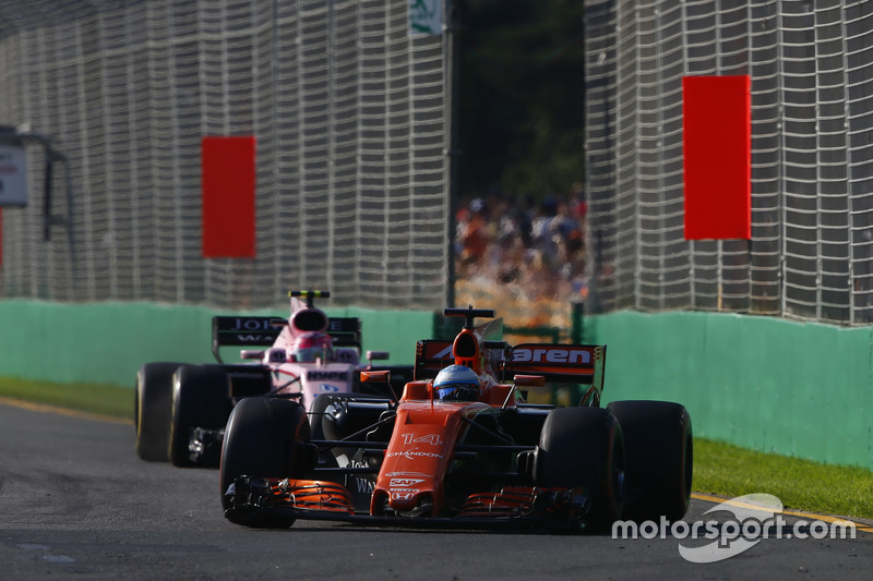 Fernando Alonso, McLaren MCL32, leads Esteban Ocon, Force India VJM10